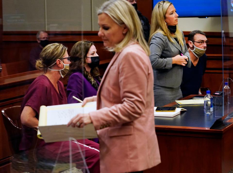 Oakland County Prosecutor Karen McDonald walks by the defense team as the parents of accused Oxford High School gunman Ethan Crumbley, Jennifer and James Crumbley are in the 52-3 District Courtroom of Judge Julie Nicholson in Rochester on Dec. 14, 2021, for a probable cause conference in their cases after being charged with involuntary manslaughter.
The Crumbleys are represented by attorneys Shannon Smith and Mariell Lehman.