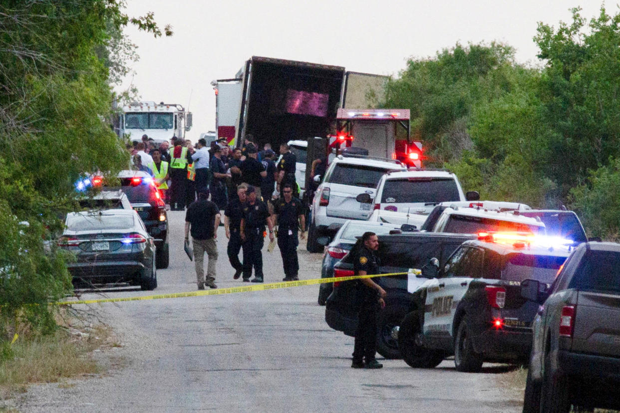 Police at the scene where migrants were found dead inside a truck in San Antonio. 