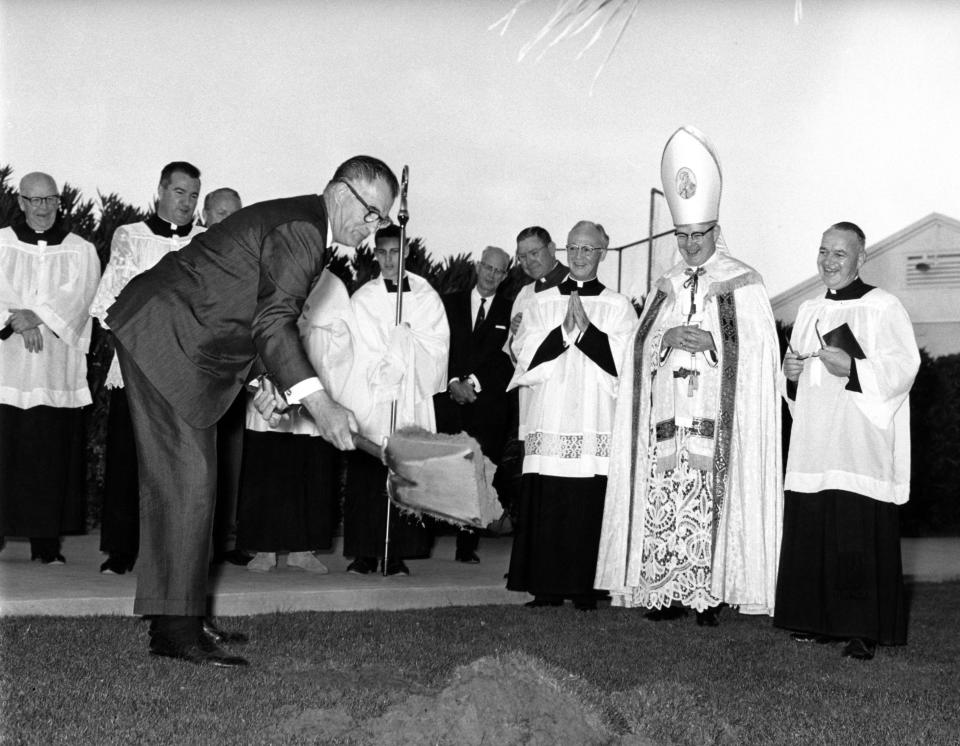 Frank Bogert breaks ground for the new St. Theresa Church.