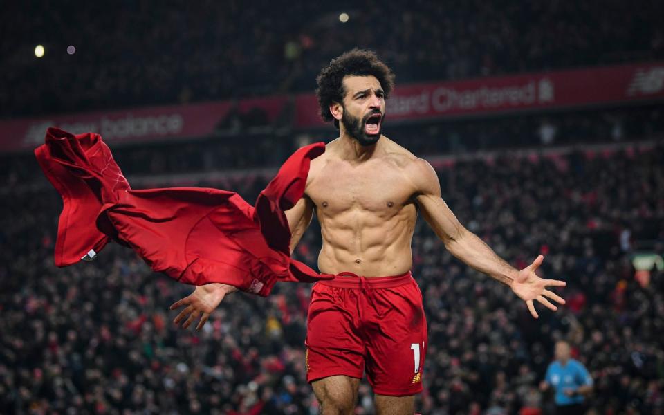 Mohamed Salah of Liverpool celebrates his goal to make it 2-0 during the Premier League match between Liverpool FC and Manchester United  - Getty Images