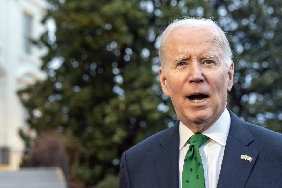 President Joe Biden speaks with reporters as he walks to Marine One upon departure from the South Lawn of the White House, Friday, March 17, 2023, in Washington. Biden is headed to Delaware. (AP Photo/Alex Brandon)