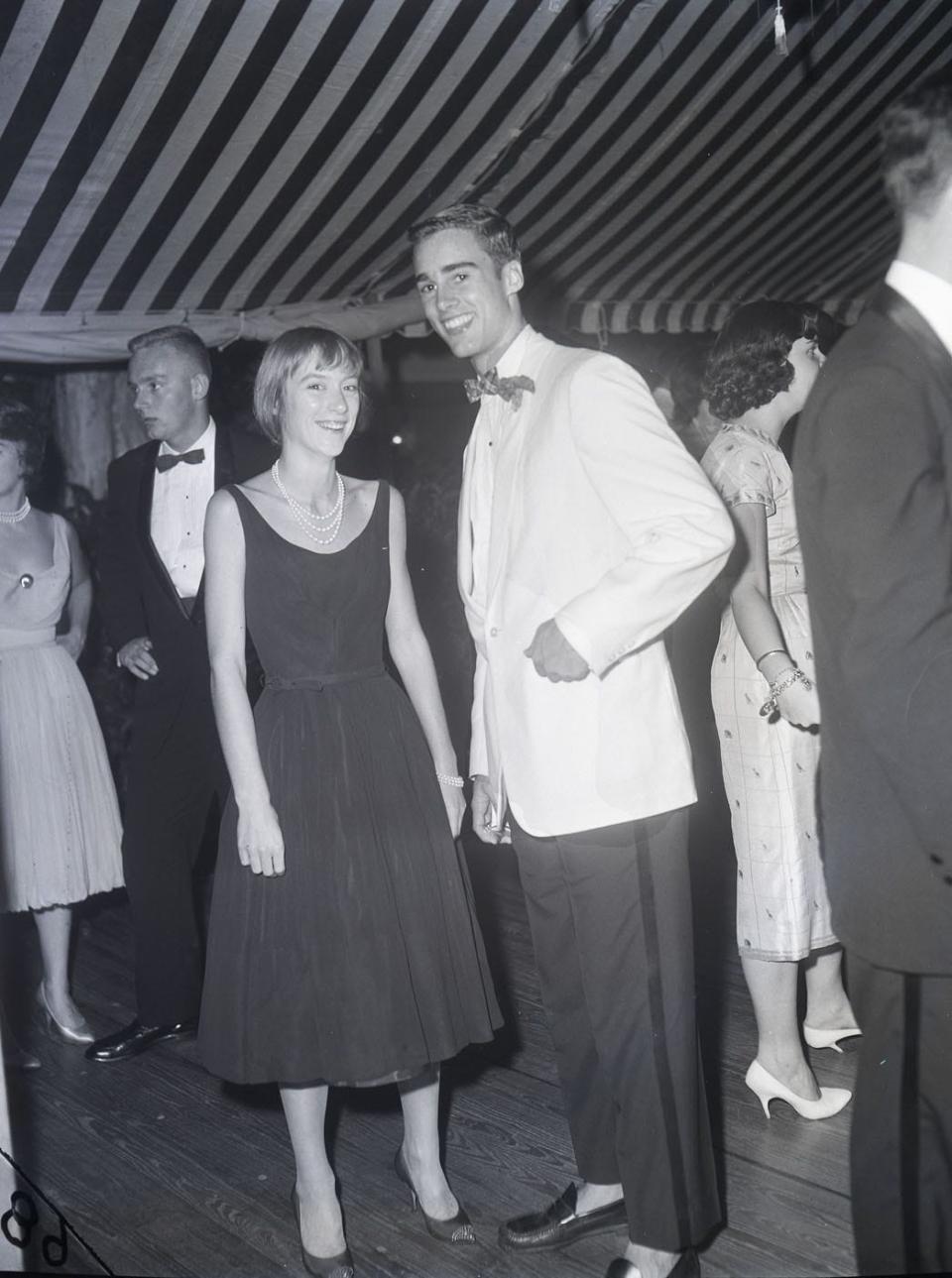Sean Flynn with fellow Palm Beach teen Bettina Bancroft at a 1959 Palm Beach dinner party.