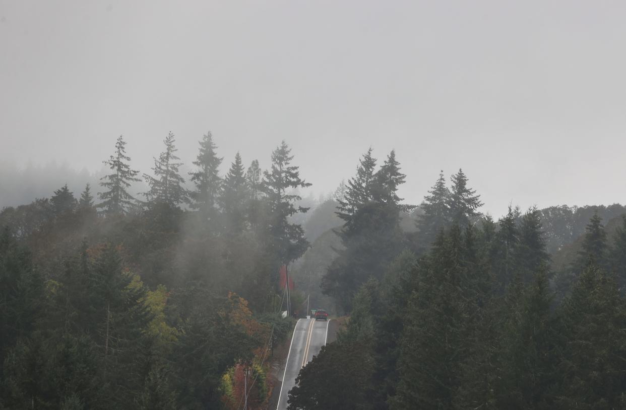 Rain comes down as cars drive along Kuebler Boulevard in Salem on Nov. 4, 2022.