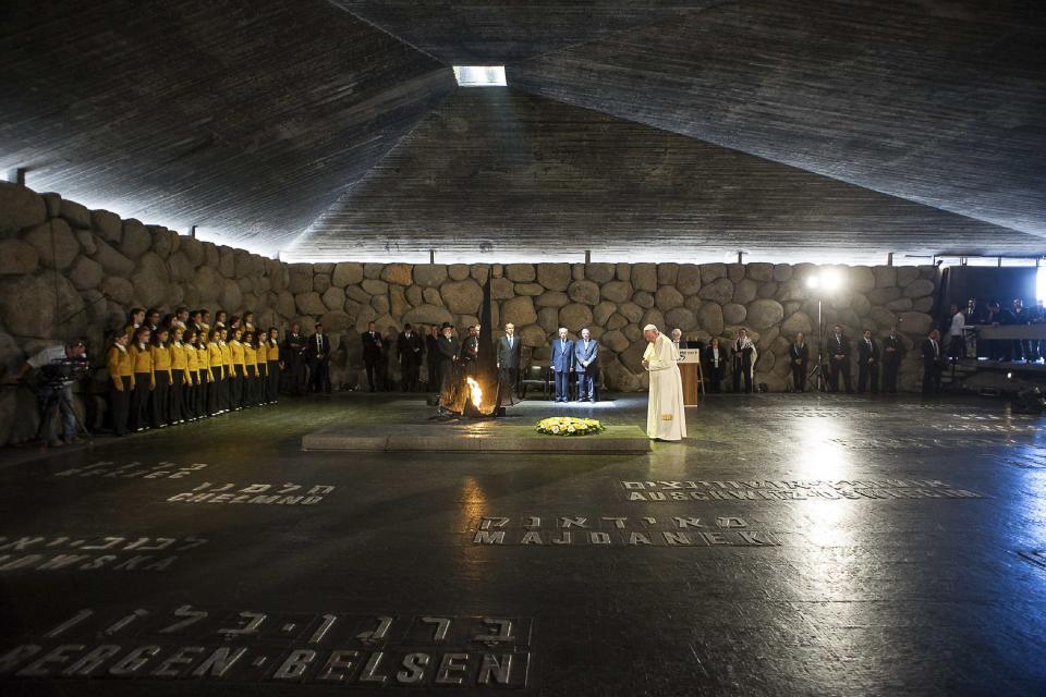 Pope Francis prays during a ceremony in the Hall of Remembrance at the Yad Vashem Holocaust memorial in Jerusalem