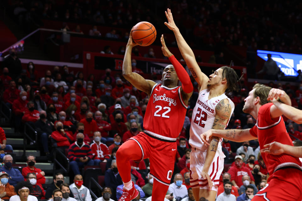 Ohio State's Malaki Branham in action against Rutgers' Caleb McConnell on Feb. 9, 2022. (Rich Schultz/Getty Images)