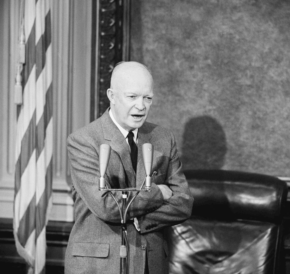 FILE - President Dwight Eisenhower discusses a possible summit conference at his meeting with reporters March 25, 1959. Eisenhower said that he believes the Western powers will have to meet at the summit with Soviet Premier Khrushchev to get any sort of valid agreement on German problems. (AP Photo/Charles Gorry, File)