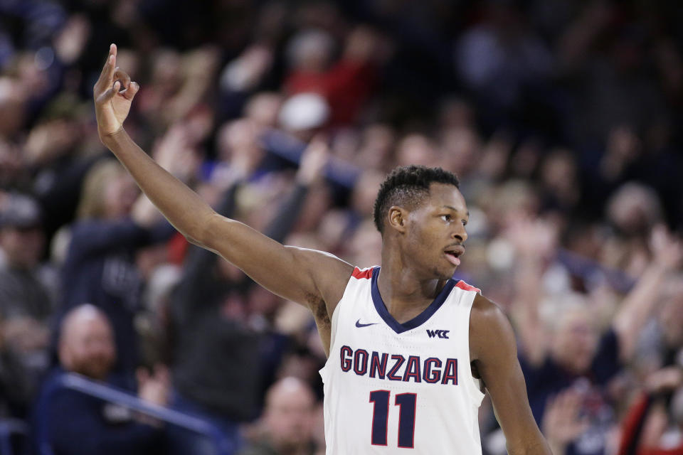 Gonzaga guard Joel Ayayi (11) gestures after scoring a 3-pointer during the second half of the team's NCAA college basketball game against Pepperdine in Spokane, Wash., Saturday, Jan. 4, 2020. Gonzaga won 75-70. (AP Photo/Young Kwak)