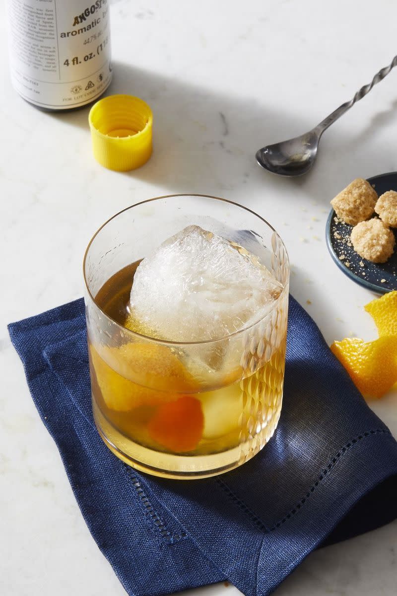 classic old fashioned cocktail with an orange rind