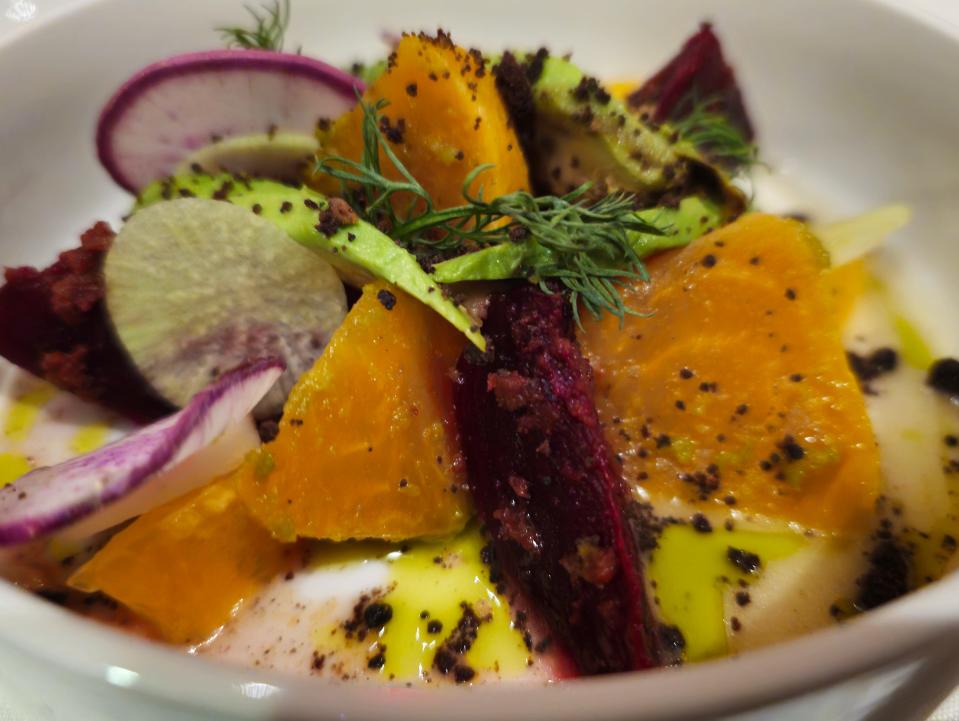 The beet and avocado salad at Oak Park tasted like it walked in from the garden that afternoon.