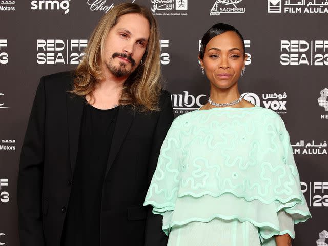 <p>Daniele Venturelli/Getty</p> Marco Perego and Zoe Saldana attend the screening of "The Absence Of Eden" during the Red Sea International Film Festival 2023 on December 02, 2023 in Jeddah, Saudi Arabia.