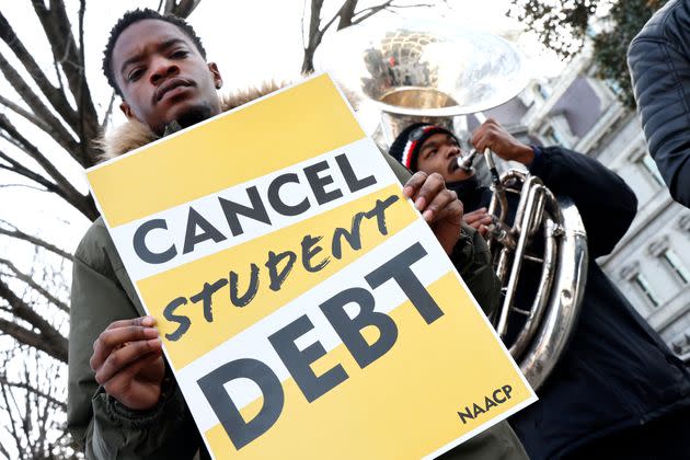 Student loan borrowers and the Too Much Talent band thank President Joe Biden and Vice President Kamala Harris for extending the student loan pause and now demand that they cancel student debt at a gathering outside The White House on Jan. 13, 2022 in Washington, D.C. (Photo: Paul Morigi via Getty Images)