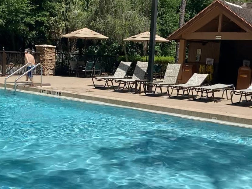 shot of the empty pool at treehouse villas at saratoga springs resort