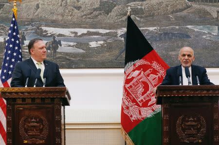 Afghan President Ashraf Ghani (R), and U.S. Secretary of State Mike Pompeo, attend a news conference in Kabul, Afghanistan July 9, 2018. REUTERS/Omar Sobhani