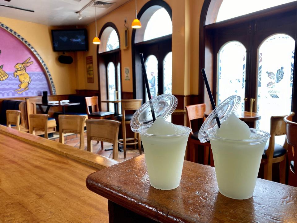 To-go cups filled with margaritas at Tequila Sunrise in Larchmont.