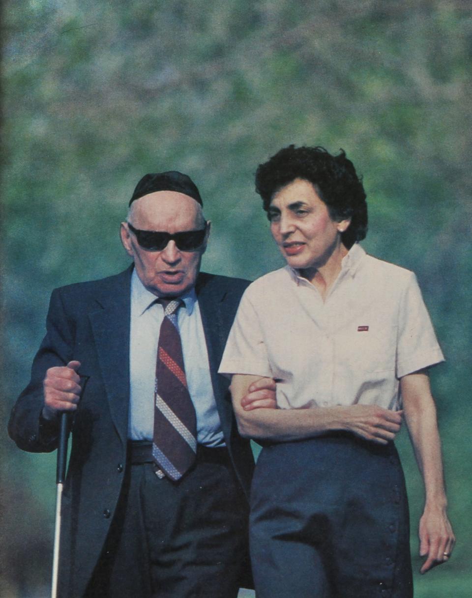 Ruth Lempert walks with her father, Sam Schafer, in this Democrat & Chronicle file photo from June 19, 1983.