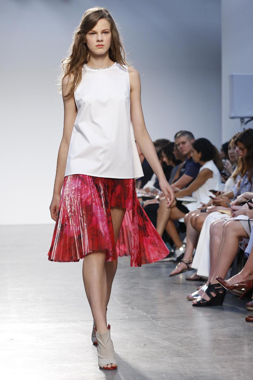 The Thakoon Spring 2014 collection is modeled during Fashion Week in New York, Sunday, Sept. 8, 2013. (AP Photo/John Minchillo)