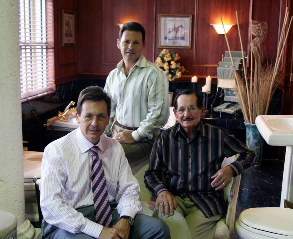 Eugenio Pino (right), and his son Sergio Pino (left), who founded Century Plumbing, are pictured with Carlos Pino (top) in October 2007.