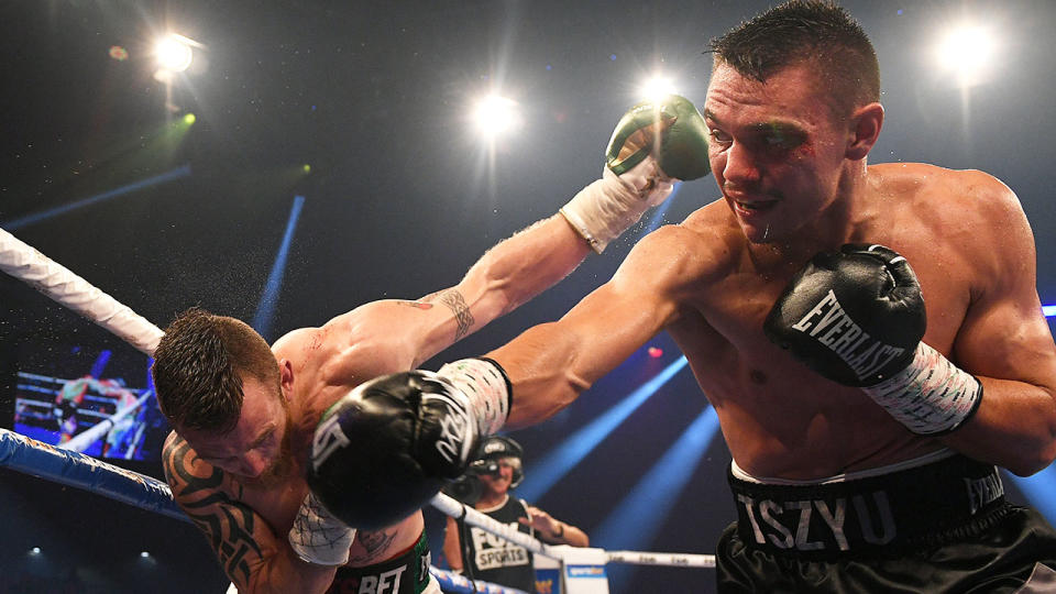 Tim Tszyu is seen here hitting Dennis Hogan with a powerful right hand.