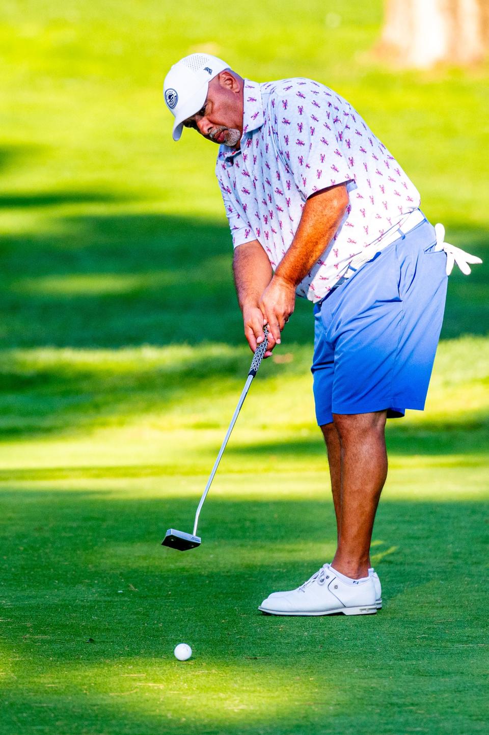 Steve Miranda takes the putt on Hole 12 at the Country Club of New Bedford Fourball Tournament.