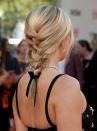 <p>A plait worn at the base of the neck and tied with a ribbon or hair accessory is simple but stylish. </p>