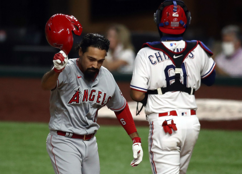 ARLINGTON, TEXAS - AUGUST 08: Anthony Rendon #6 of the Los Angeles Angels throws off his helmet.