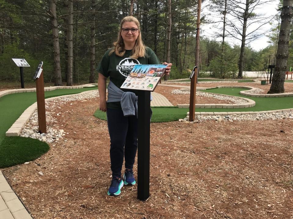 Signs offering information about ecology and the environment are located around the course at Evergreen Miniature Golf in Fish Creek, where owner Kerry Johnson said she wants to provide a fun educational experience.