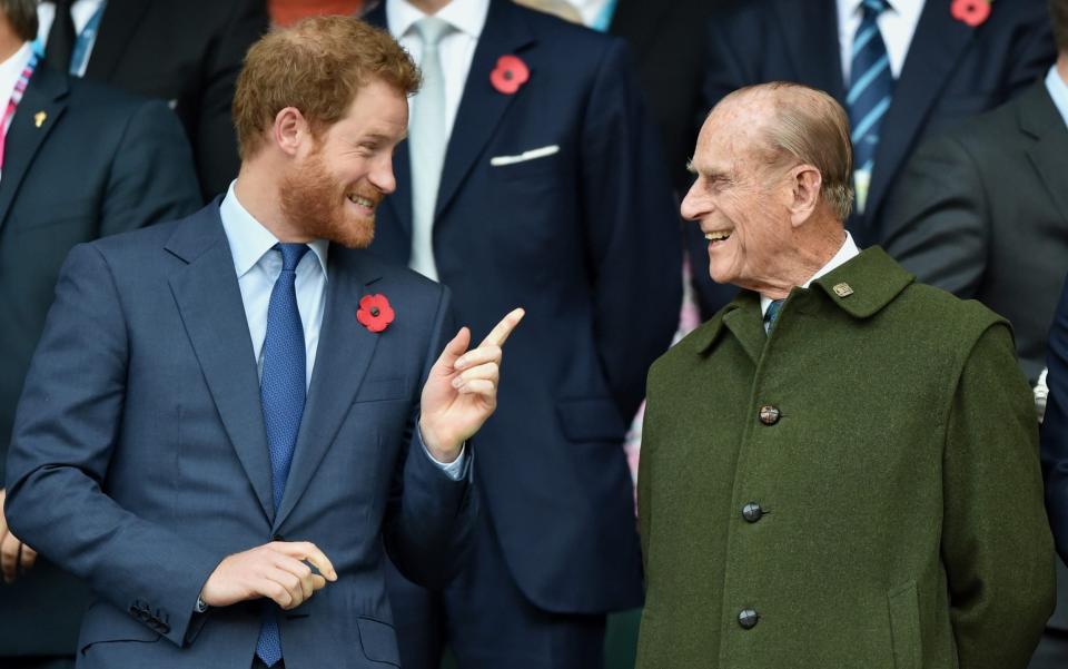  Prince Harry and Prince Philip, Duke of Edinburgh attend the 2015 Rugby World Cup Final match between New Zealand and Australia at Twickenham Stadium on October 31, 2015 in London, England - Max Mumby/Indigo 