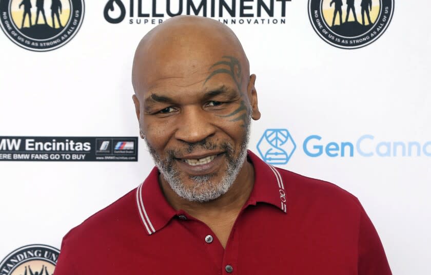 FILE - Mike Tyson attends a celebrity golf tournament in Dana Point, Calif., Aug. 2, 2019.