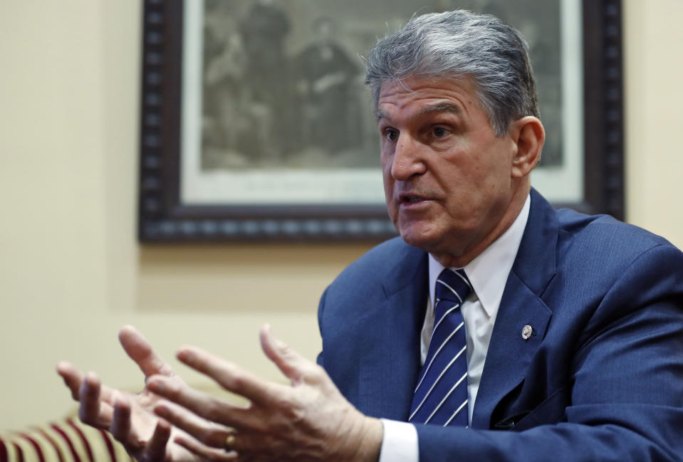 FILE - In this Feb. 1, 2017, file photo, Sen. Joe Manchin, D-W.Va. speaks during an Associated Press interview in his office on Capitol Hill in Washington. It's a rare and momentous decision, one by one, seated at desks centuries old, senators will stand and cast their votes for a Supreme Court nominee. It's a difficult political call in the modern era, especially for the 10 Democrats facing tough re-election next year in states that President Donald Trump won. (AP Photo/Alex Brandon, File)