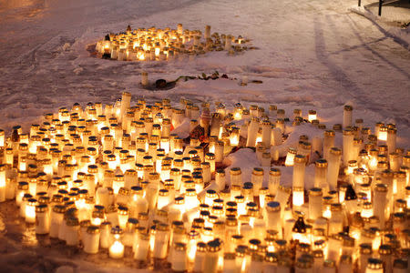 Candles in front of the restaurant Vuoksenvahti where three women were killed in a shooting incident in Imatra, Finland December 5, 2016 Lehtikuva/Lauri Heino/via REUTERS ATTENTION EDITORS - THIS IMAGE WAS PROVIDED BY A THIRD PARTY. FOR EDITORIAL USE ONLY. NO THIRD PARTY SALES. NOT FOR USE BY REUTERS THIRD PARTY DISTRIBUTORS. FINLAND OUT. NO COMMERCIAL OR EDITORIAL SALES IN FINLAND.