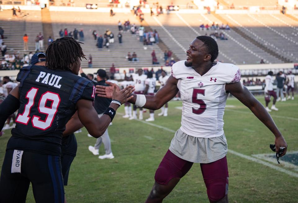 Jackson State's wide receiver Kobe Paul (19) shakes hands with Texas Southern's wide receiver Quay Davis (5) after Jackson State's win at the Mississippi Veterans Memorial Football Stadium in Jackson, Miss., on Saturday, Nov. 4, 2023.