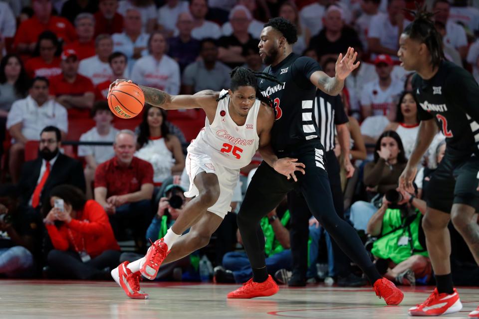 UC big man Jamille Reynolds guards Houston's Joseph Tugler Feb. 27. The Cougars won 67-59 at the Fertitta Center, and the Bearcats fell to 16-12 and 5-10 in the Big 12, good for 12th place.