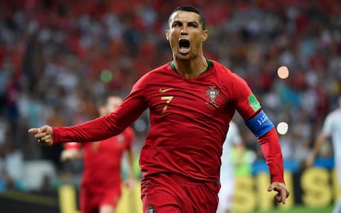 Ronaldo celebrates scoring his 4th-minute penalty - Credit: NELSON ALMEIDA/AFP/Getty Images