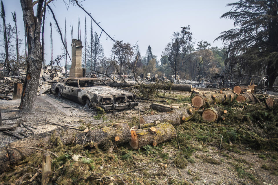 TALENT, ORE - SEPTEMBER 18, 2020: A general view of burned out vehicles amid the aftermath of the Almeda Fire. The town of Talent, Oregon, showing the burned out homes, cars and rubble left behind. In Talent, about 20 miles north of the California border, homes were charred beyond recognition. Across the western US, at least 87 wildfires are burning, according to the National Interagency Fire Center. They've torched more than 4.7 million acres -- more than six times the area of Rhode Island. Credit: Chris Tuite/imageSPACE/MediaPunch /IPX