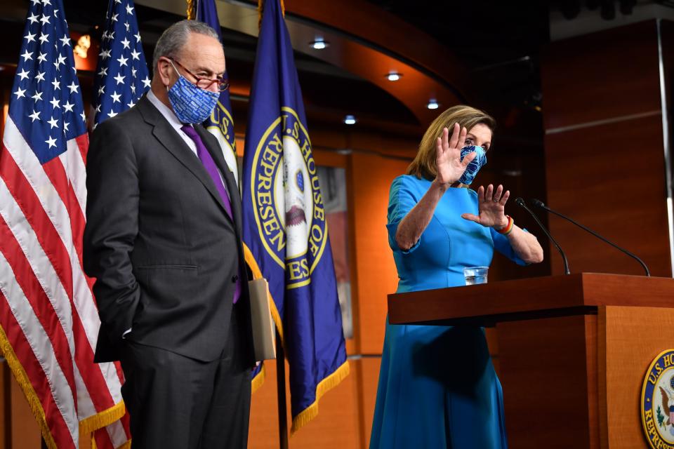 US Speaker of the House, Nancy Pelosi (R), Democrat of California, and Senate Minority Leader Chuck Schumer, Democrat of New York hold a press briefing on Capitol Hill in Washington, DC, on November 6, 2020. (Photo by Nicholas Kamm / AFP) (Photo by NICHOLAS KAMM/AFP via Getty Images)