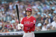 Los Angeles Angels' Shohei Ohtani smiles before batting against the Detroit Tigers in the first inning of a baseball game in Detroit, Friday, Aug. 19, 2022. (AP Photo/Paul Sancya)