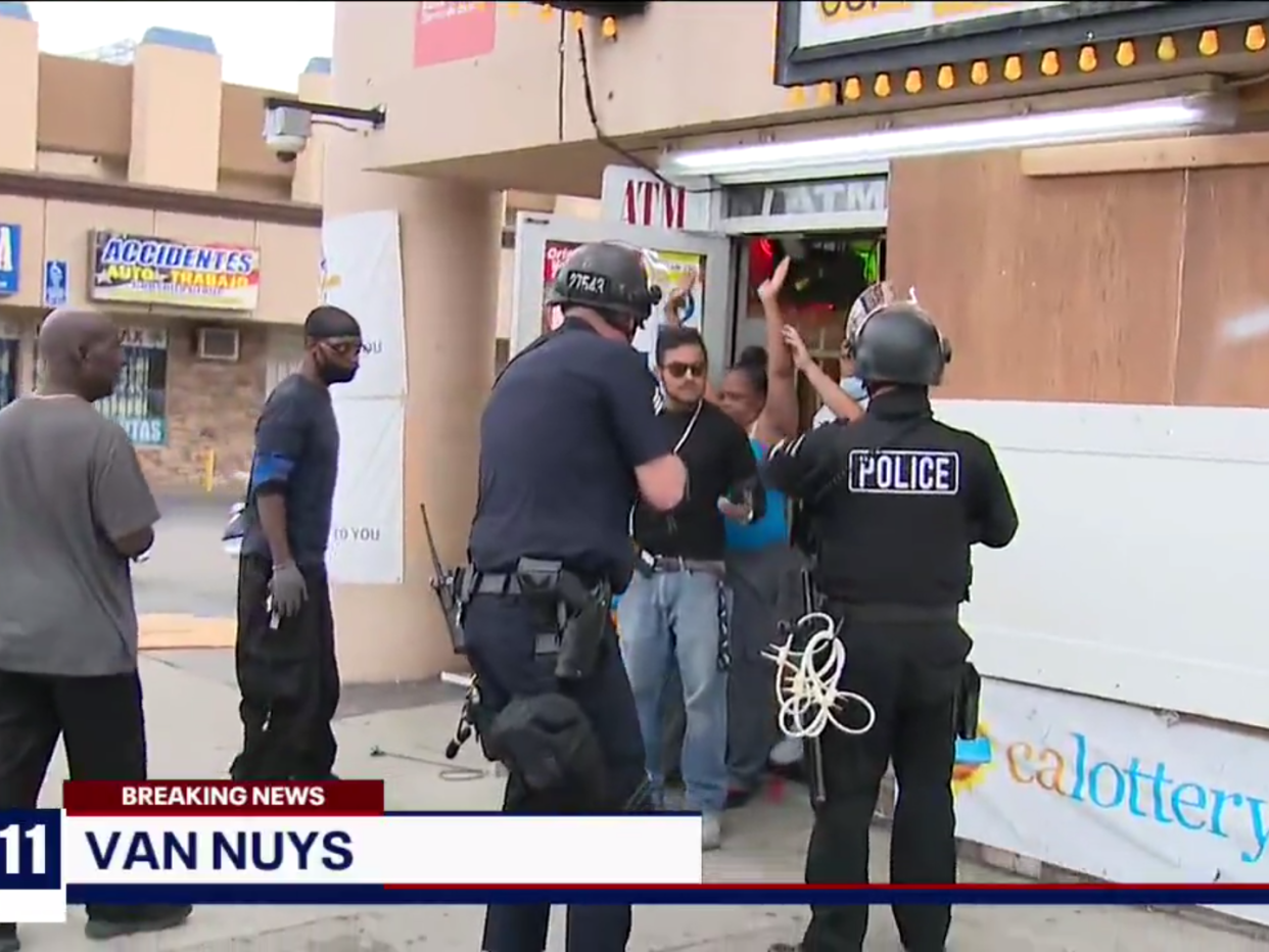 Police in Los Angeles arrested local people who were protecting another business from looters: Fox 11
