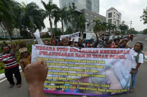 Activists in Jakarta protest against the 2014 shootings of four teenagers in Indonesia's insurgency-wracked Papua province