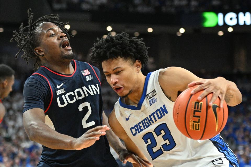 Creighton guard Trey Alexander dribbles against Connecticut's Tristen Newton in their Feb. 20 matchup in Omaha.