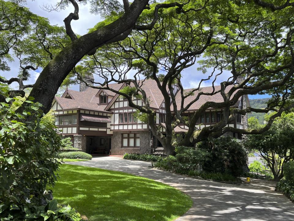 This image shows an exterior view of the Manoa Heritage Center in Honolulu, founded in 1996 by Sam and Mary Cooke in 1996. (Kristina Linnea Garcia via AP)