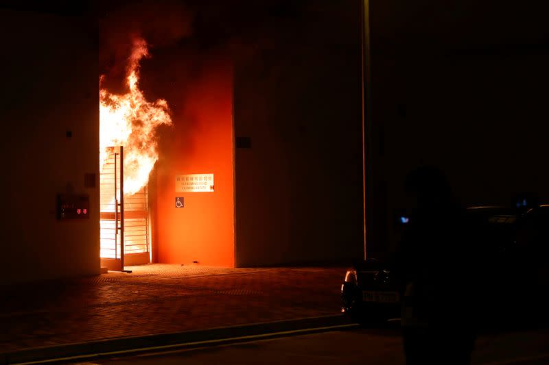 Anti-government protesters set alight the lobby of a newly built residential building that authorities planned to use as a quarantine facility, as public fears about the coronavirus outbreak intensify in Hong Kong