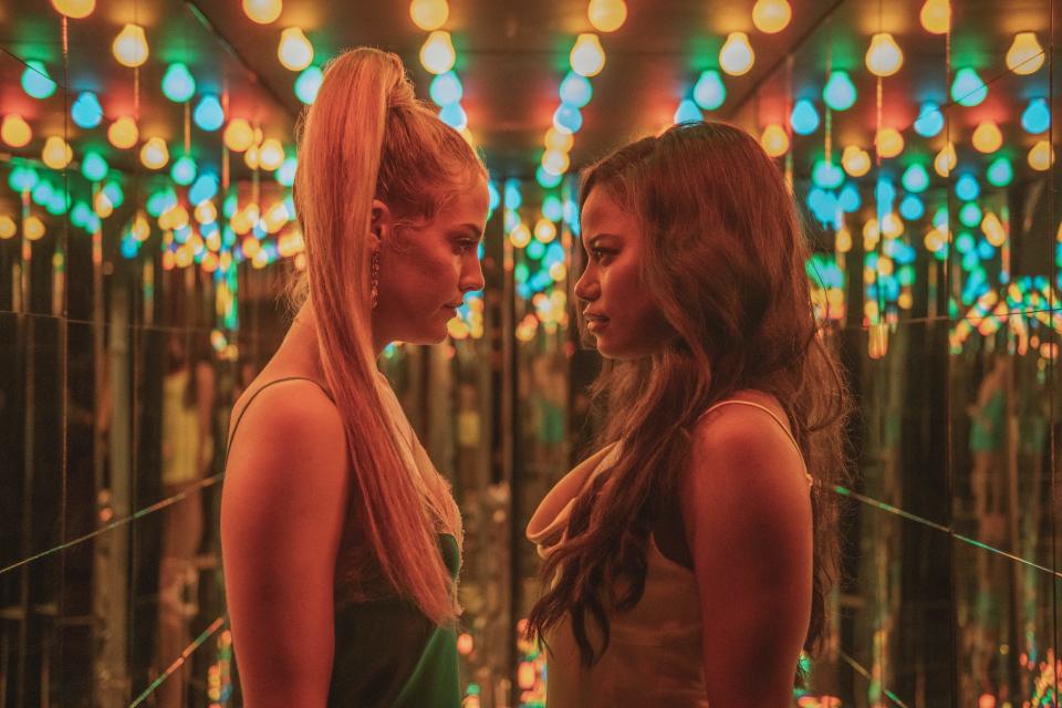 Stefani (Riley Keough, left) and Zola (Taylour Paige) head on a crazy road trip of hedonism in "Zola."