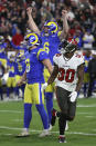 Los Angeles Rams' Johnny Hekker (6) celebrates after kicker Matt Gay (8) kicked the game-winning field goal against the Tampa Bay Buccaneers during the second half of an NFL divisional round playoff football game Sunday, Jan. 23, 2022, in Tampa, Fla. (AP Photo/Mark LoMoglio)