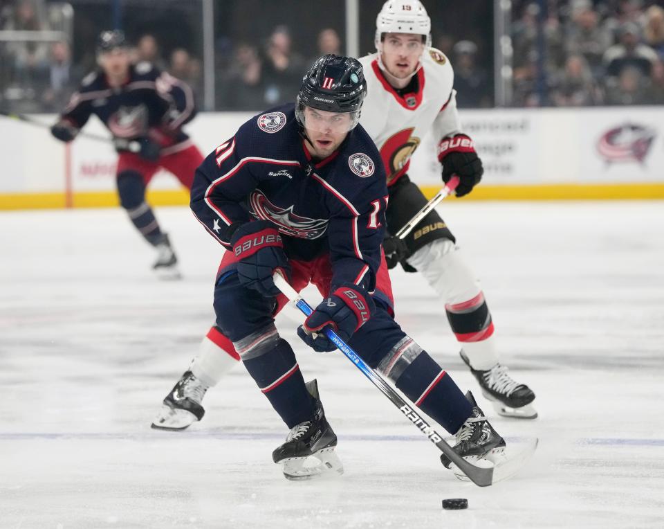 Dec. 1, 2023; Columbus, Ohio, USA; 
Columbus Blue Jackets center Adam Fantilli (11) is pursued by Ottawa Senators right wing Drake Batherson (19) during the first period of FridayÕs hockey game at Nationwide Arena.