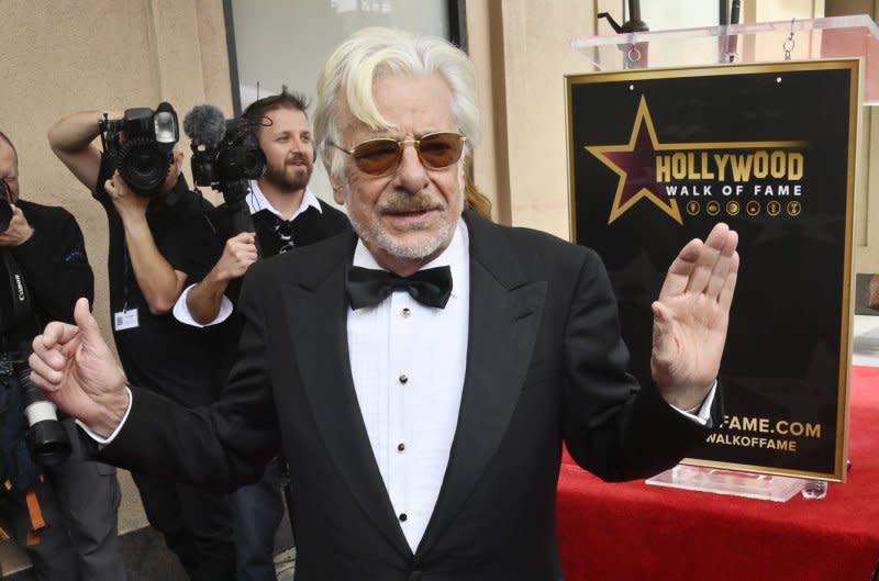 Giancarlo Giannini stands atop his star after receiving the 2,752nd star on the Hollywood Walk of Fame during an unveiling ceremony in Los Angeles in 2023. File Photo by Jim Ruymen/UPI