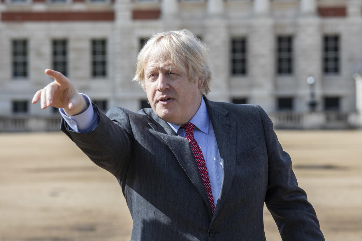 LONDON, ENGLAND - JUNE 18: British Prime minister, Boris Johnson and French President, Emmanuel Macron (not seen) in Horseguards parade ground to watch the red arrows and La Patrouille de France fly over to commemorate the appeal of the 18th June speech by Charles De Gaulle on June 18, 2020 in London, England. the  L'Appel du 18 Juin (The Appeal of 18 June) was the speech made by Charles de Gaulle to the French in 1940 and broadcast in London by the BBC. It called for the Free French Forces to fight against German occupation. The appeal is often considered to be the origin of the French Resistance in World War II. President Macron is the first foreign dignitary to visit the UK since the Coronavirus Lockdown began. (Photo by Jack Hill - WPA pool/Getty Images)