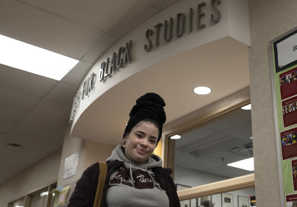 Chelsey Sarante poses in front of the Center for Black Studies at Denison University in Granville.