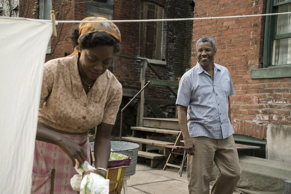 This image released by Paramount Pictures shows Denzel Washington, right, and Viola Davis in a scene from "Fences," directed by Washington. (David Lee/Paramount Pictures via AP)