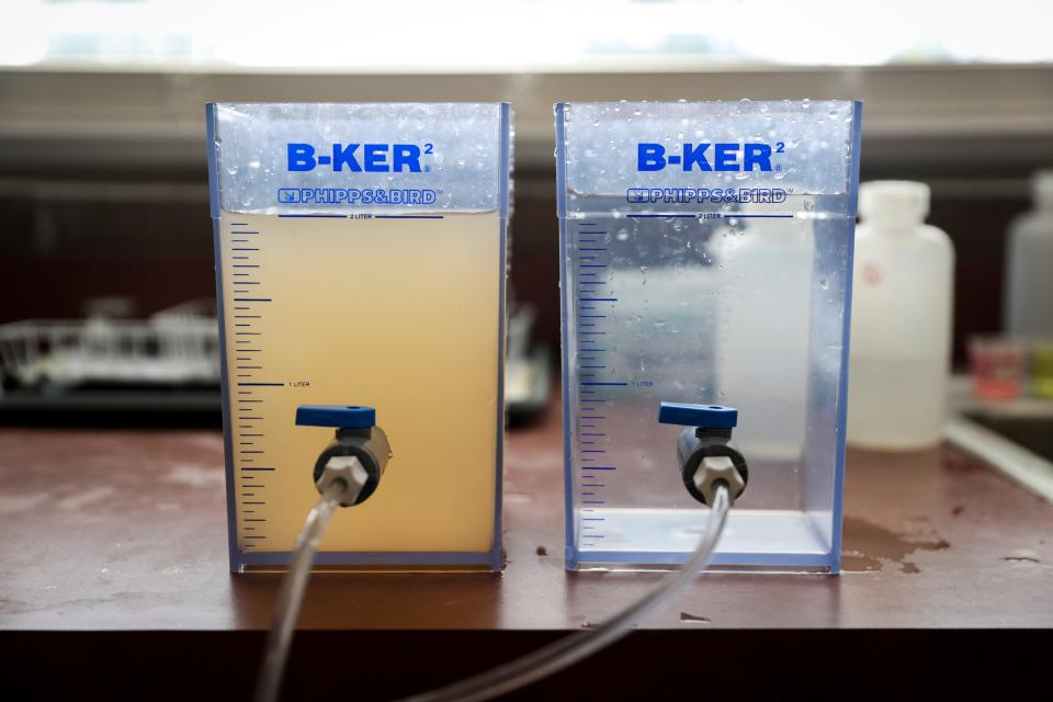 A container on the left shows water coming from Foster Lake and a container on the right shows water treated by the Sweet Home Water Treatment Plant in November.