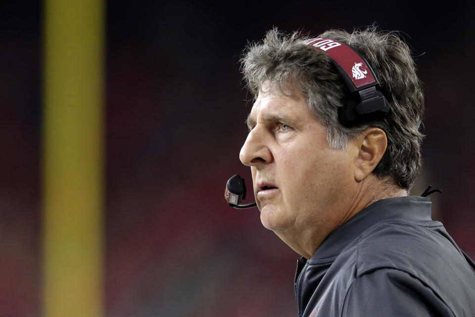 FILE - In this Sept. 13, 2019, file photo, Washington State head coach Mike Leach watches during the second half of an NCAA college football game against Houston, in Houston. Two people with knowledge of the decision says Mississippi State has hired Washington State's Mike Leach as its new head coach. The people spoke to The Associated Press on condition of anonymity Thursday, Jan. 9, 2020, because the school has not yet officially announced the move. Leach will replace Joe Moorhead, who was fired last week after two seasons. (AP Photo/Michael Wyke, File)